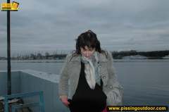 MILF outdoor pissing on pier - N