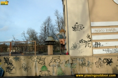 Outdoor pissing near graffiti - N