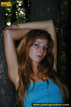 Outdoor pissing in the night of teen redhead girl - N