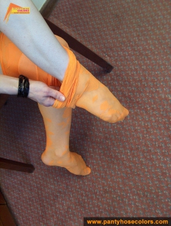 Orange pantyhose fetish teen girl posing on the floor - N