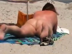 fat-grandma-gets-a-tan-at-the-beach