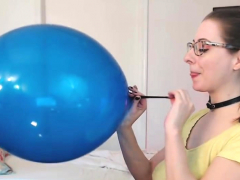 lintilla-blows-up-a-big-blue-balloon