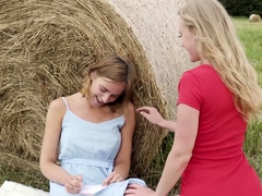 Oxana was hanging out in the hay field writing in her